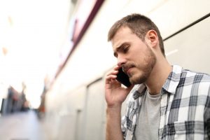 Frustrated man on phone